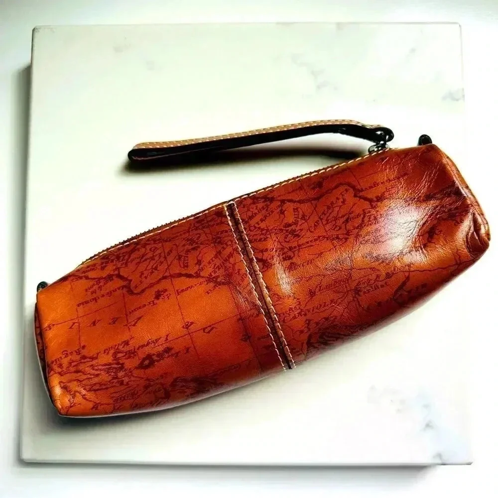 NWOT Patricia Nash Map Print Italian Leather Isla Cosmetic Bag Riot Rust